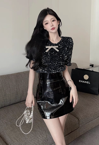 Stylish Black Sequin Top with Bow Detail and Leather Skirt