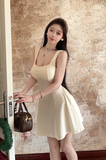 Elegant Sleeveless Cream Dress with Square Neckline