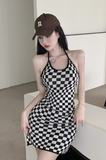 Stylish Black - and - White Checkered Dress Paired with Logo Cap