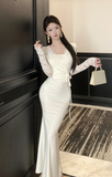 Stylish Long - Sleeved Ivory Gown with Delicate Lace Design