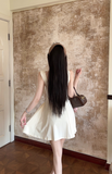 Elegant Sleeveless Cream Dress with Square Neckline