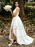 Woman in a white dress holding a bouquet