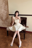 Elegant Sleeveless Cream Dress with Square Neckline