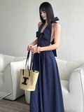 Elegant White Striped Halter Neck Maxi Dress with Front Bow