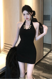 Stylish Sleeveless White Dress with Decorative Gold Buttons