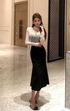 Stylish Outfit with Sheer Lace Blouse and Flared Black Skirt