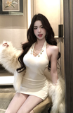 Stylish Sleeveless White Dress with Decorative Gold Buttons