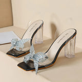 RHINESTONE BOW TRANSPARENT CRYSTAL SANDALS