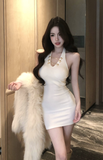 Stylish Sleeveless White Dress with Decorative Gold Buttons
