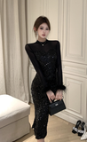 Stylish Long - Sleeve Black Gown with Sparkling Sequin Detailing
