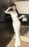 Stylish Long - Sleeved Ivory Gown with Delicate Lace Design