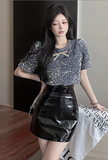 Stylish Black Sequin Top with Bow Detail and Leather Skirt
