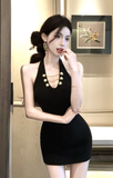 Stylish Sleeveless White Dress with Decorative Gold Buttons