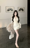 Elegant Cream Outfit with Lace - detailed Top and Mini Skirt