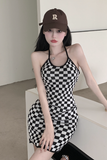 Stylish Black - and - White Checkered Dress Paired with Logo Cap