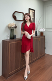 Elegant Red Ruched Midi Dress with V - Neck Design
