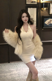 Stylish Sleeveless White Dress with Decorative Gold Buttons