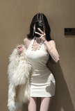Stylish Sleeveless White Dress with Decorative Gold Buttons