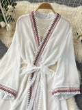 White Reimagination of Vintage Charm Robe