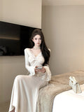 Elegant Long - Sleeve Ivory Mermaid Dress with Lace Cuffs