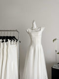 Classic White Flowing Satin Dress