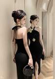 Stylish Black Sling Maxi Dress with Gold Accessory and Split