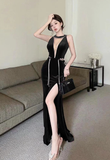 Elegant Sleeveless Black Dress with Silver Trim and Split