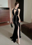 Elegant Sleeveless Black Dress with Silver Trim and Split