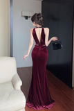 Elegant Sleeveless Black Dress with Silver Trim and Split