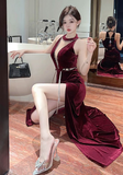 Elegant Sleeveless Black Dress with Silver Trim and Split