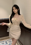 Graceful Ivory Dress with Lace - up Bodice and Satin Skirt