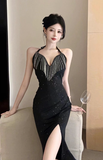 Glamorous Black Halter Gown with Sequin Embellishments and High Slit