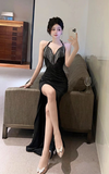 Glamorous Black Halter Gown with Sequin Embellishments and High Slit