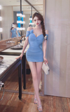 Elegant Off - the - Shoulder Sling Mini Dress in Pure White