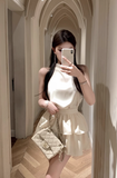 Charming Sleeveless Halter Dress in Cream with Ruffled Skirt