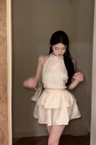 Charming Sleeveless Halter Dress in Cream with Ruffled Skirt