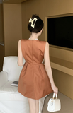 Charming Sleeveless Dress in Rust Color with Large Bow Detail