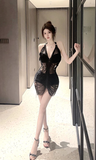 Stylish Black Bodycon Dress with Strappy Halter and Tassel Accents