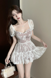 Delicate White Lace Dress with Puff Sleeves and Ruffled Hem