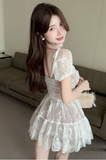 Delicate White Lace Dress with Puff Sleeves and Ruffled Hem