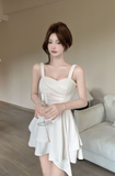 Elegant Ivory Sling Dress with Pleated Bodice and Asymmetric Hem