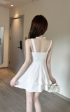 Elegant Ivory Sling Dress with Pleated Bodice and Asymmetric Hem