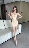 Elegant Sleeveless Beige Outfit with Ruched Skirt