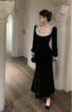 Elegant Black Velvet Gown with White Lace Trim