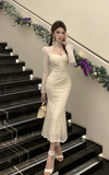 Elegant Cream Lace Mermaid Dress with High Neck Detail
