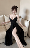 Elegant Black Spaghetti Strap Gown with Sheer Panels