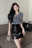 Stylish Black Sequin Top with Bow Detail and Leather Skirt