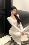Stylish Long - Sleeved Ivory Gown with Delicate Lace Design