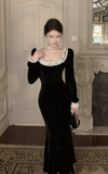 Elegant Black Velvet Gown with White Lace Trim