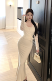 Stylish Long - Sleeved Ivory Gown with Delicate Lace Design